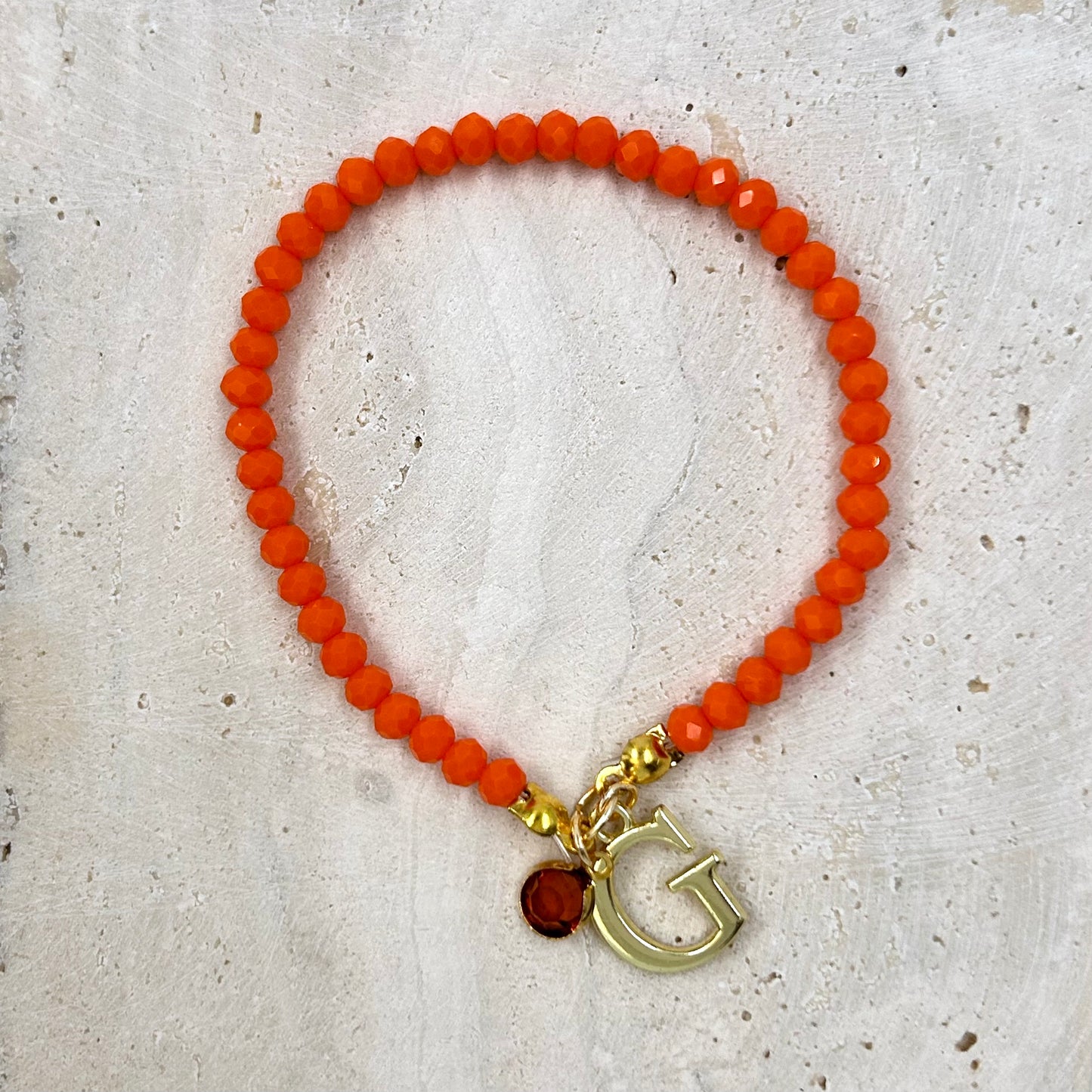 Orange Crystal Bead Initial Bracelet with a stone